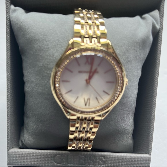 Michael Kor’s Gold-Tone watch with rhinestone embellishment. - Picture 2 of 5